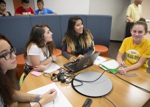 Students in the Hoover STEM Academy get to work on the opening day of their new home.