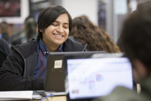 High school student working on a computer