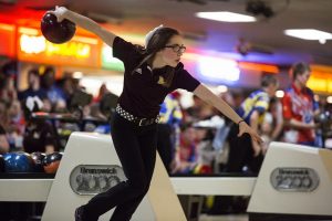 Girl bowling.