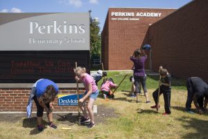 Students planting a garden at school